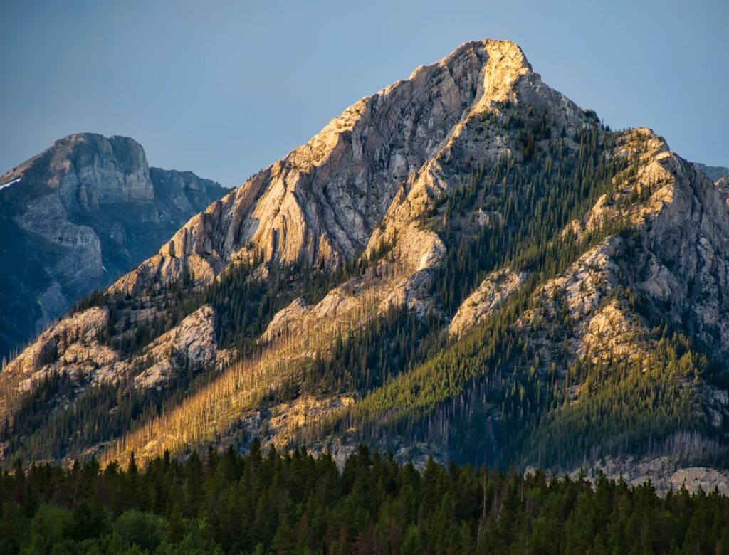 Captivating view of the Rocky Mountains at sunset in Banff National Park, showcasing stunning natural beauty.
